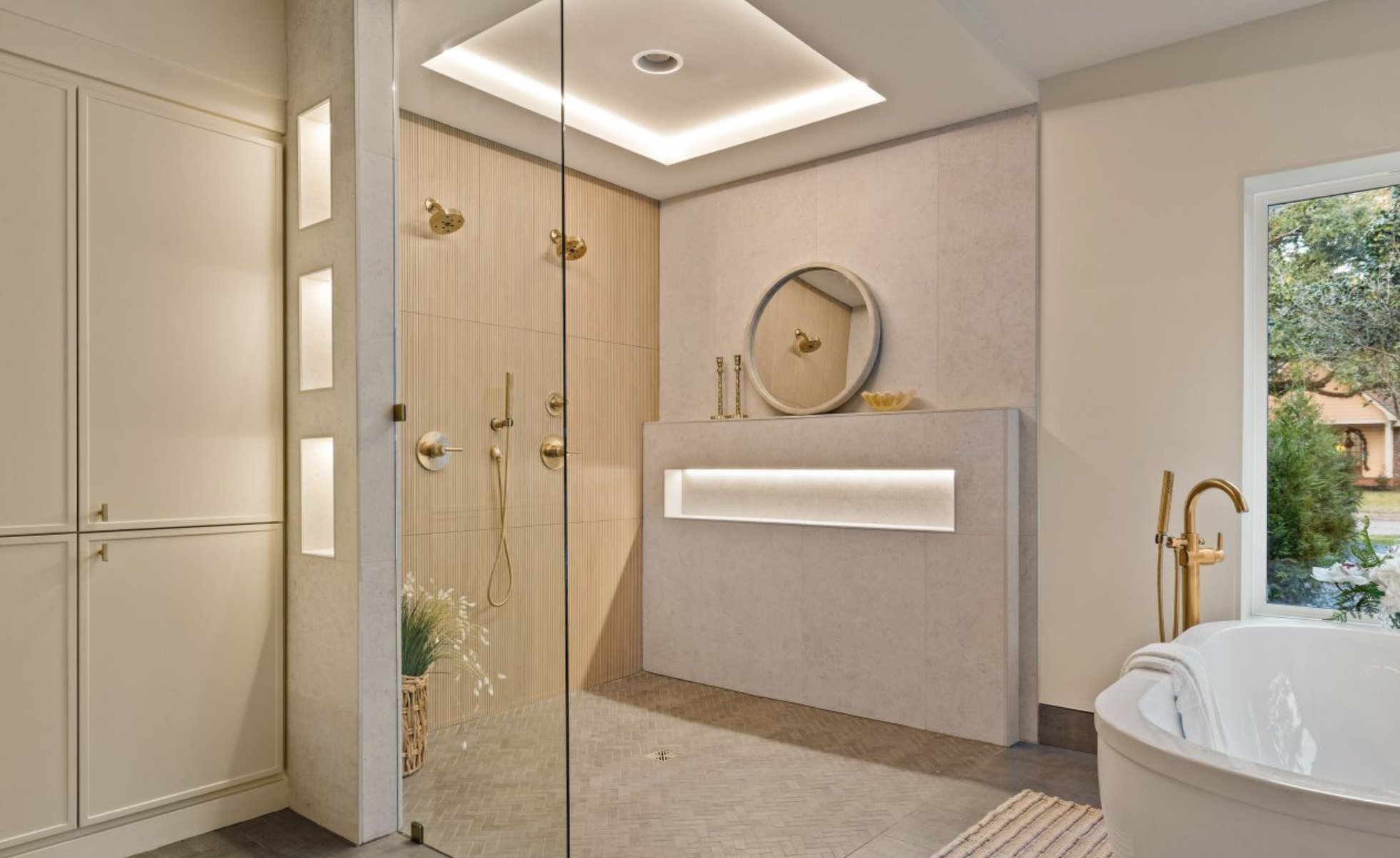 Luxury bathroom remodel in Lafayette featuring walk-in shower, freestanding tub, and custom finishes