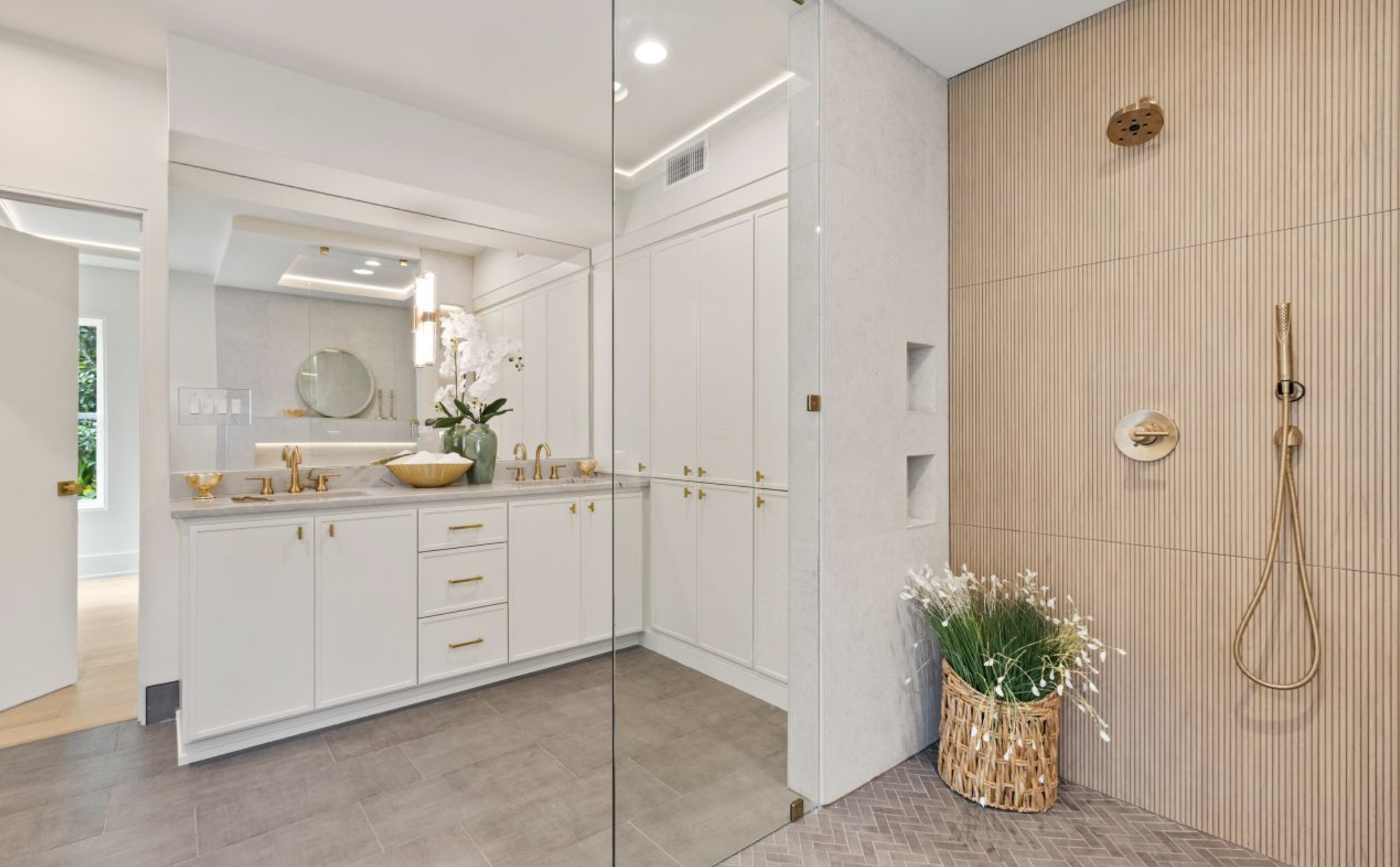 Walk-in shower with custom tile and rainfall shower system